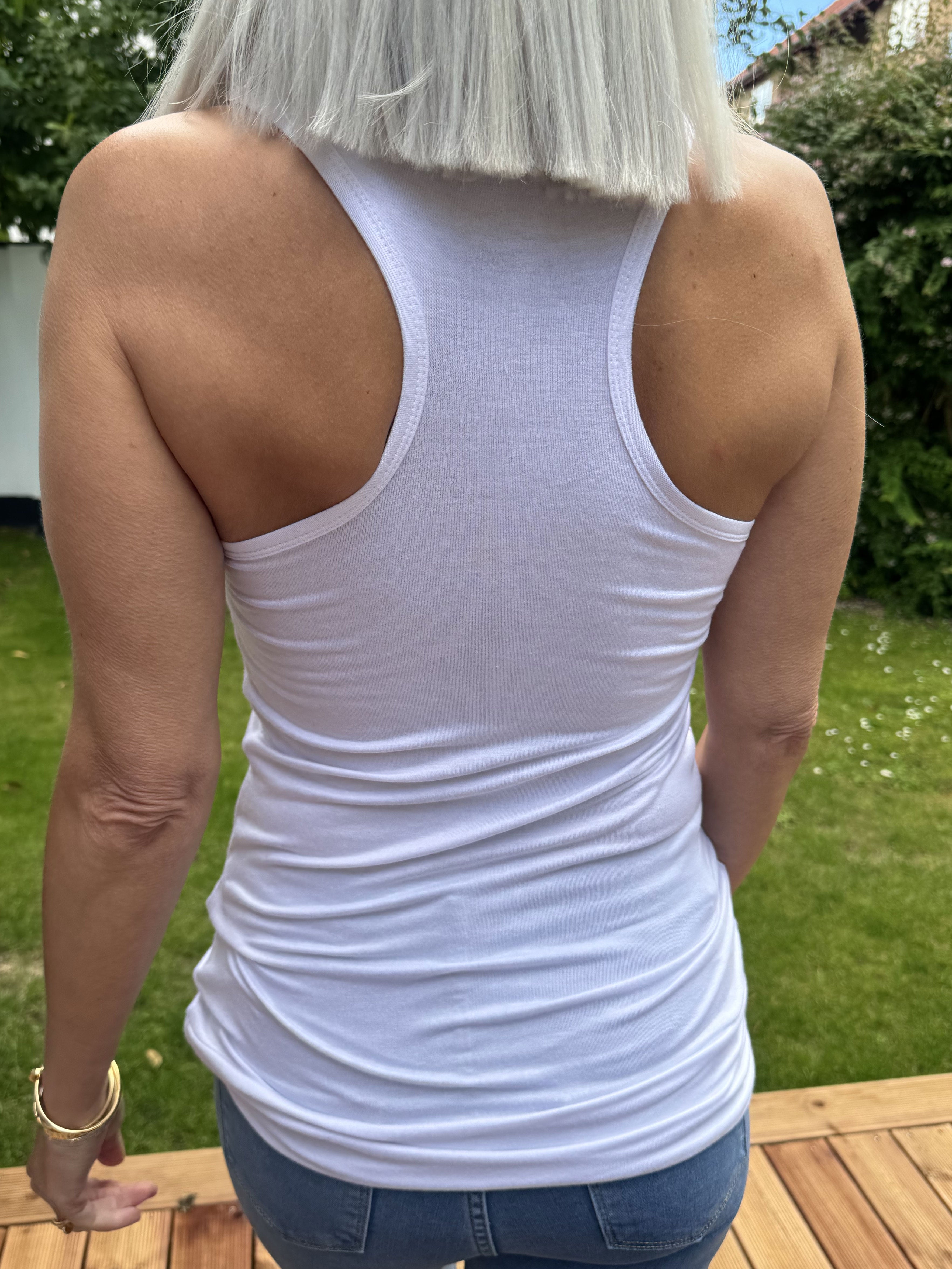 Kos - Basis top i åndbart stof